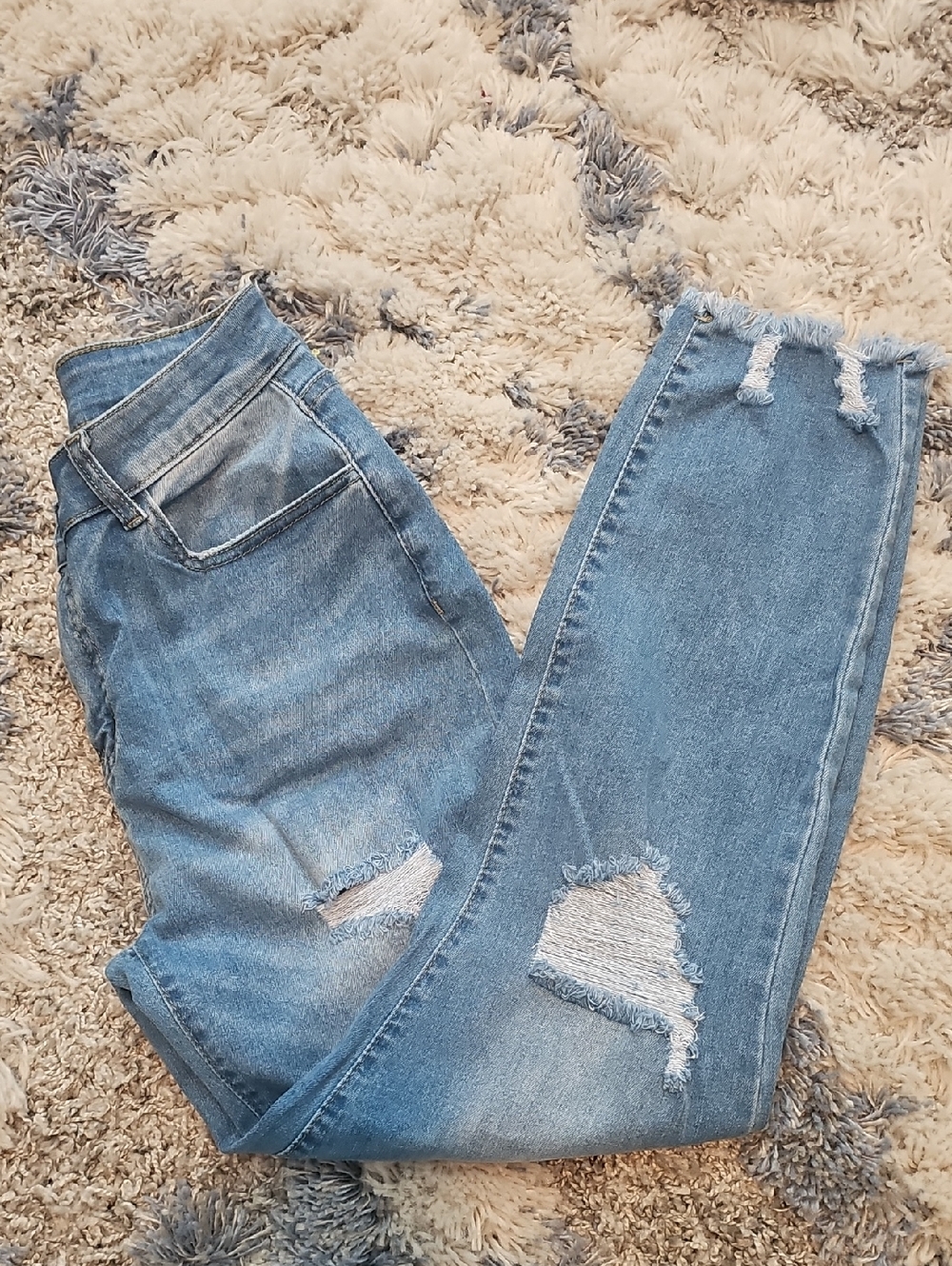 Women’s Light Blue Distressed High-Rise Jeans